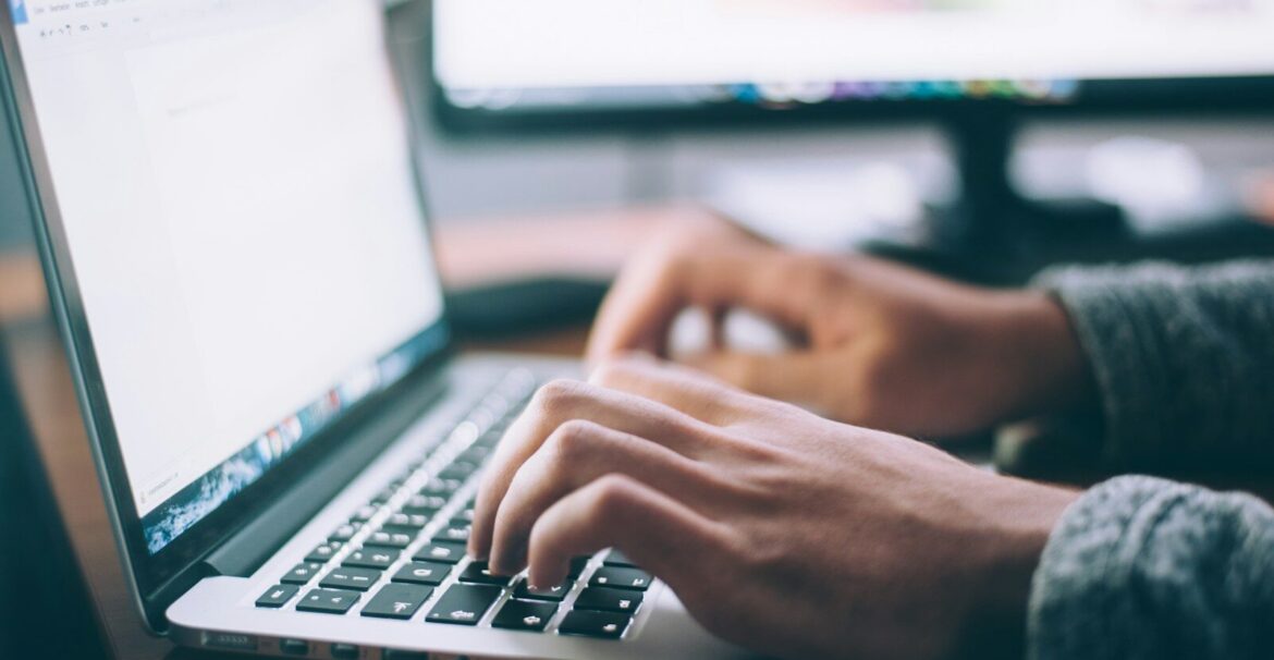 person using MacBook Pro